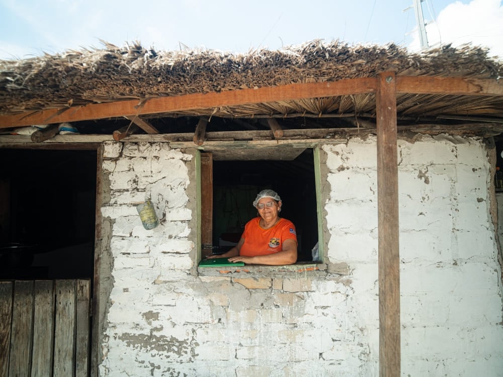 Dona Dete, posing for a photo in a house in Lençóis Maranhenses Dona Dete, posing for a photo in a house in Lençóis Maranhenses