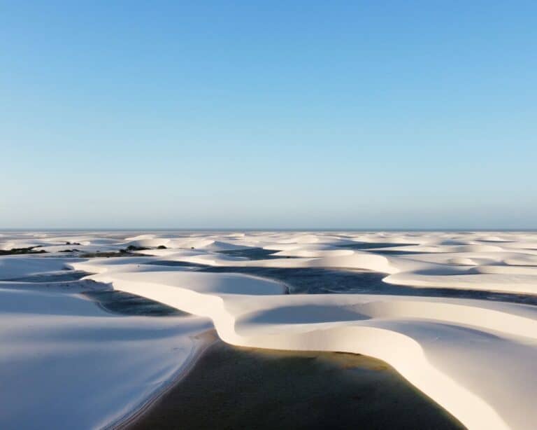 White sand dunes and turquoise rainwater pools across Lençóis Maranhenses National Park