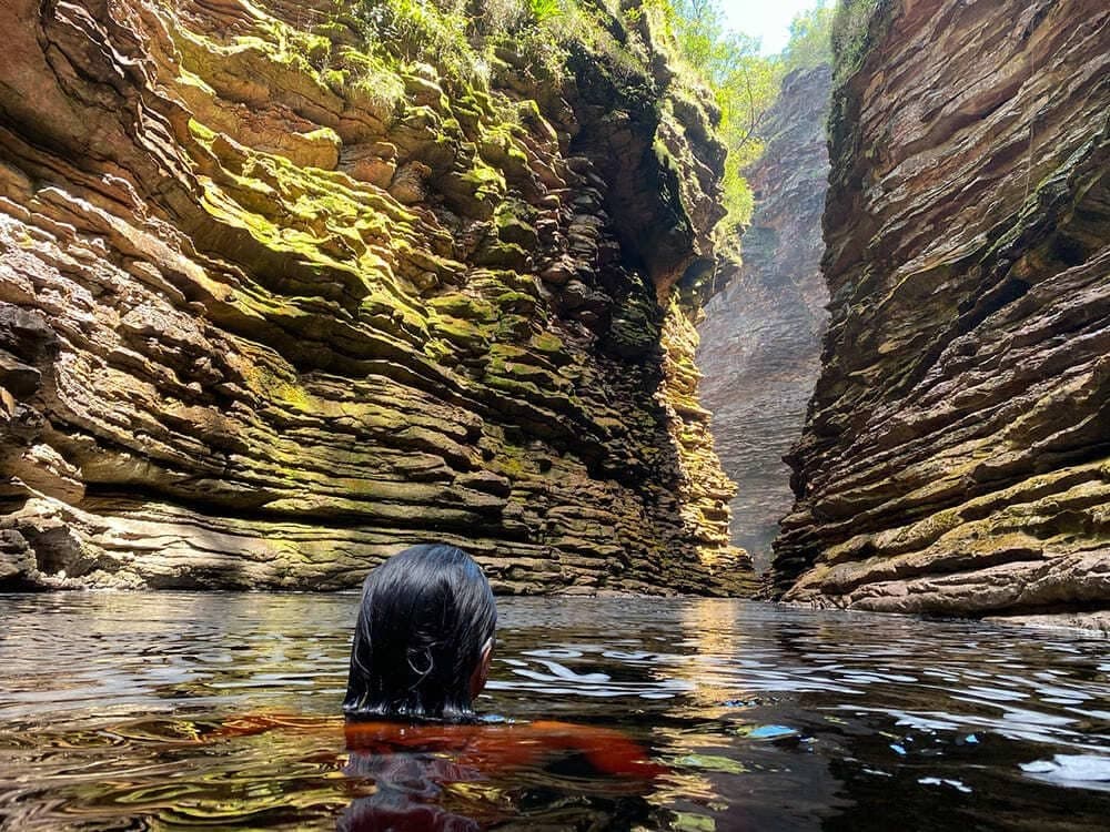 Swallowed by sandstone — nothing above but a ribbon of sky. Photo 2
