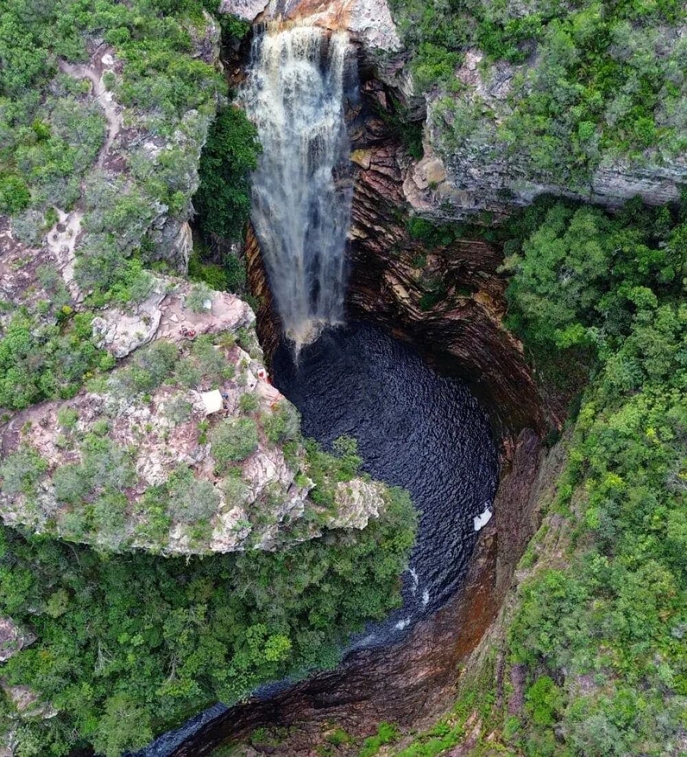 Hundreds of metres of freefall, one perfect dark pool waiting below. Photo 1